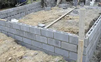 Professionals building a foundation with blocks in Pueblo, CO