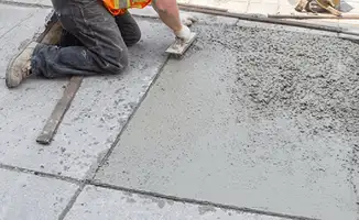 Professional repairing a concrete floor in Pueblo, CO